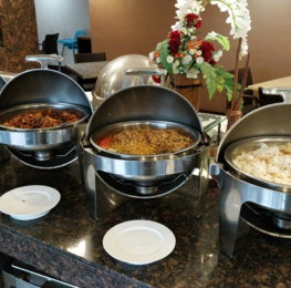 A buffet with many different types of food on it